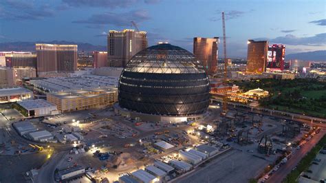 MSG Sphere in Las Vegas covered in swirling lava visuals .